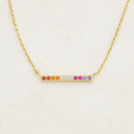 Lesbian line necklace featuring colours of the lesbian flag, front angle