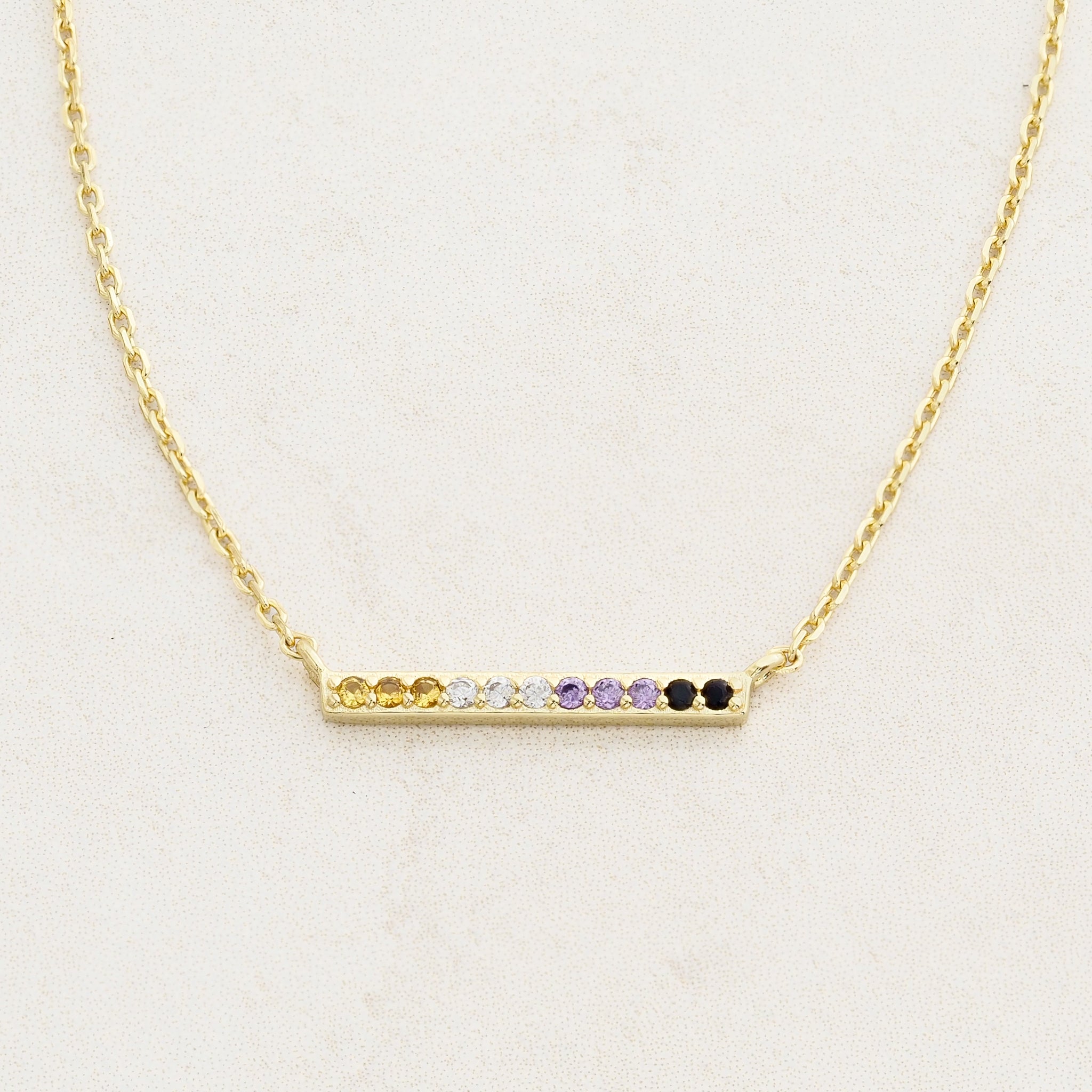 Non-Binary line necklace featuring colours of the Non-Binary flag, front on