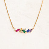 Rainbow Collision Necklace featuring rainbow colours from the LGBT pride flag, close