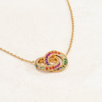 Rainbow Necklace featuring double ring elements and the colours of the rainbow LGBT pride flag, left