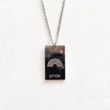 pride tag necklace with rainbow symbol and pride text in pride jewellery collection, silver close