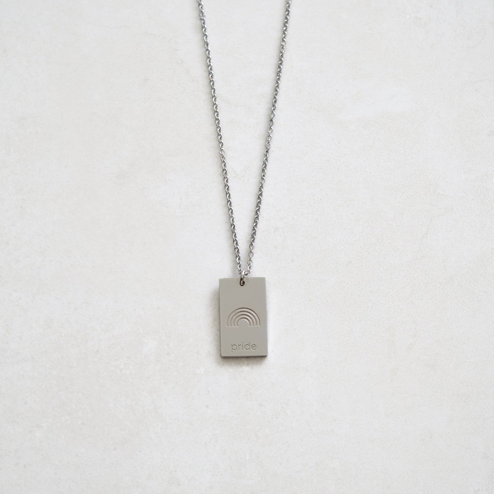 pride tag necklace with rainbow symbol and pride text in pride jewellery collection, silver front