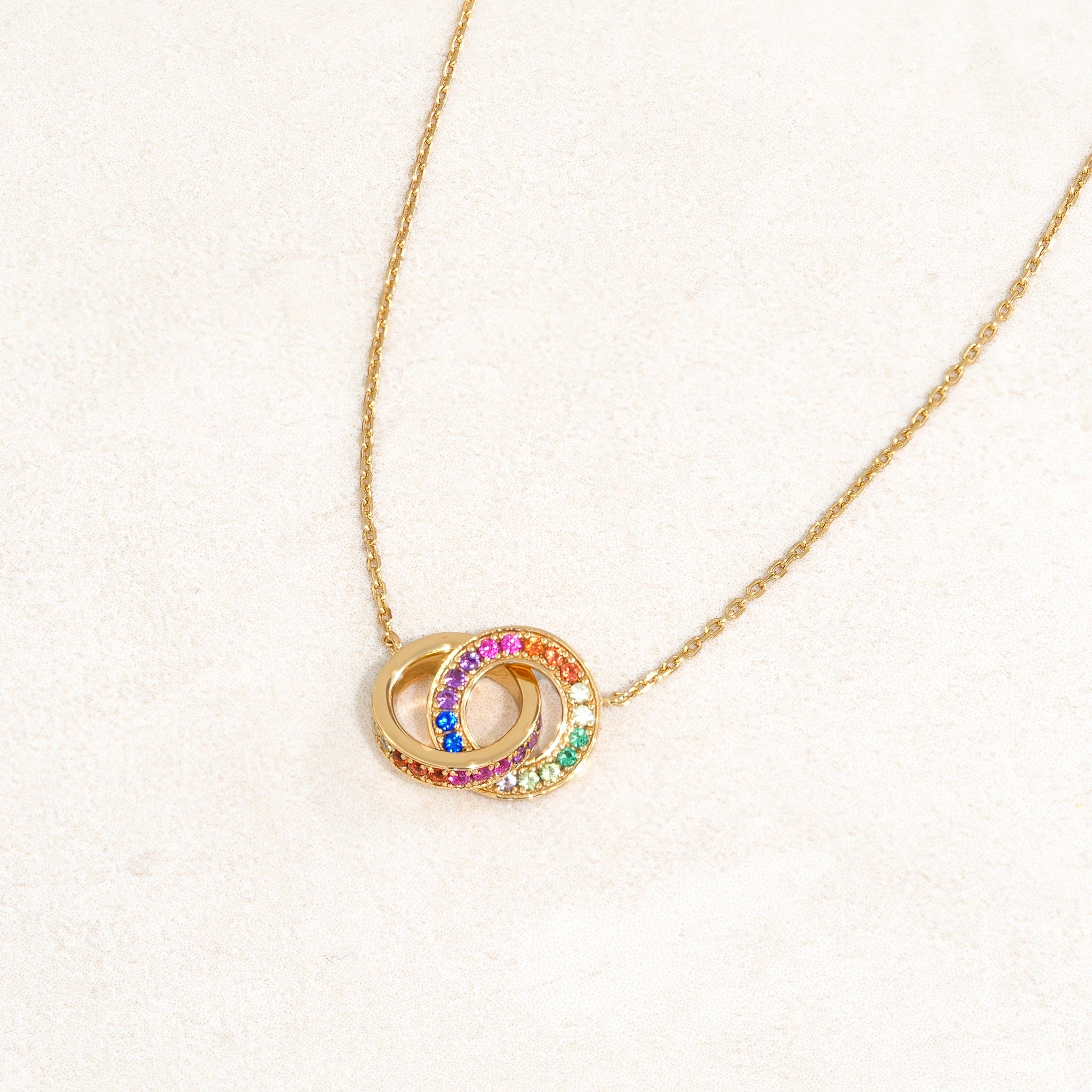 Rainbow Necklace featuring double ring elements and the colours of the rainbow LGBT pride flag, right
