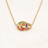 Rainbow Necklace featuring double ring elements and the colours of the rainbow LGBT pride flag, close
