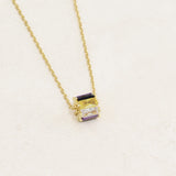 Non-Binary revolve necklace featuring colours of the Non-Binary flag, left