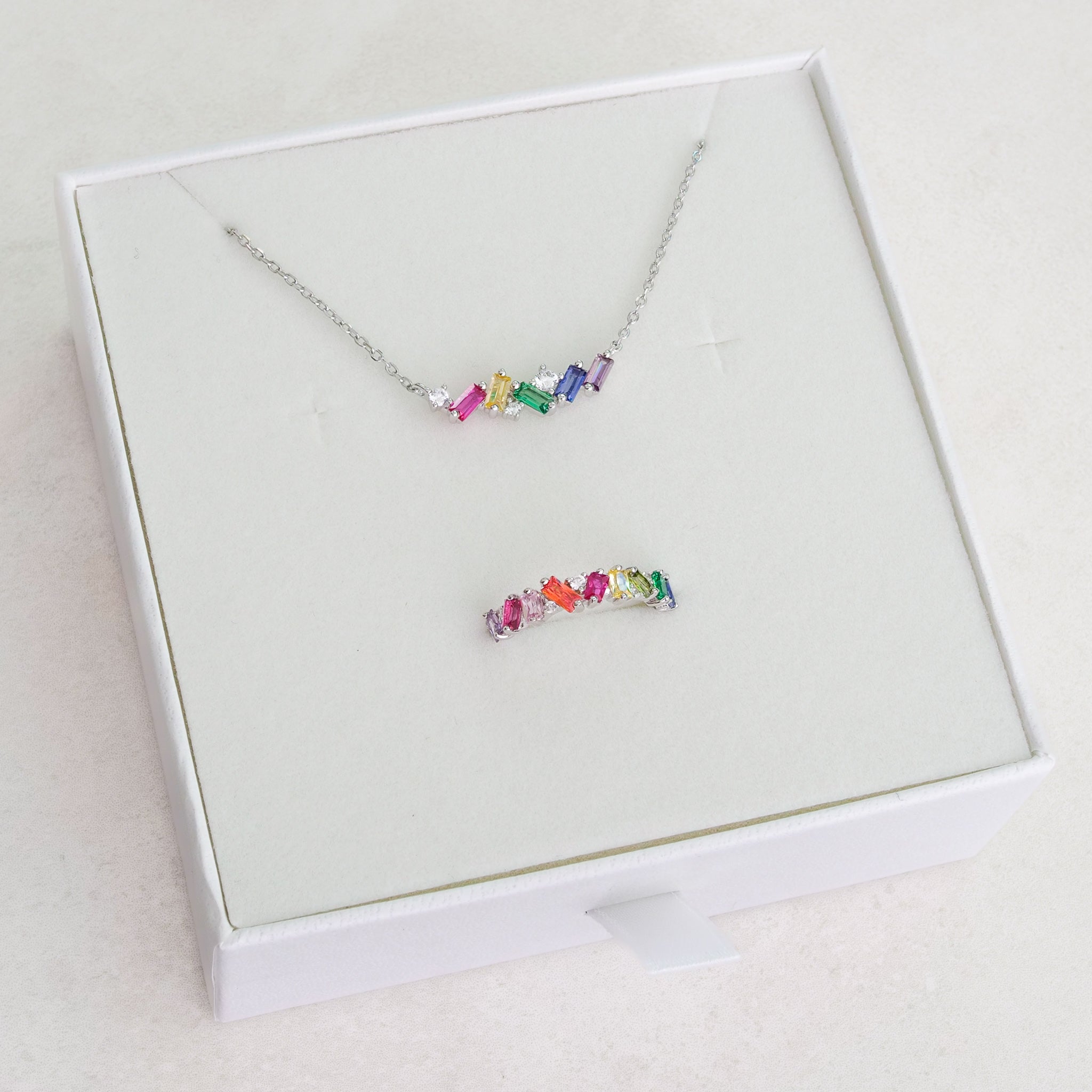luxury rainbow jewellery, high quality and durable. dainty Rainbow ring, and dainty rainbow necklace