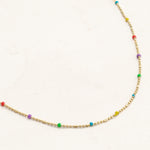 rainbow gold bead necklace pride jewelry, close up