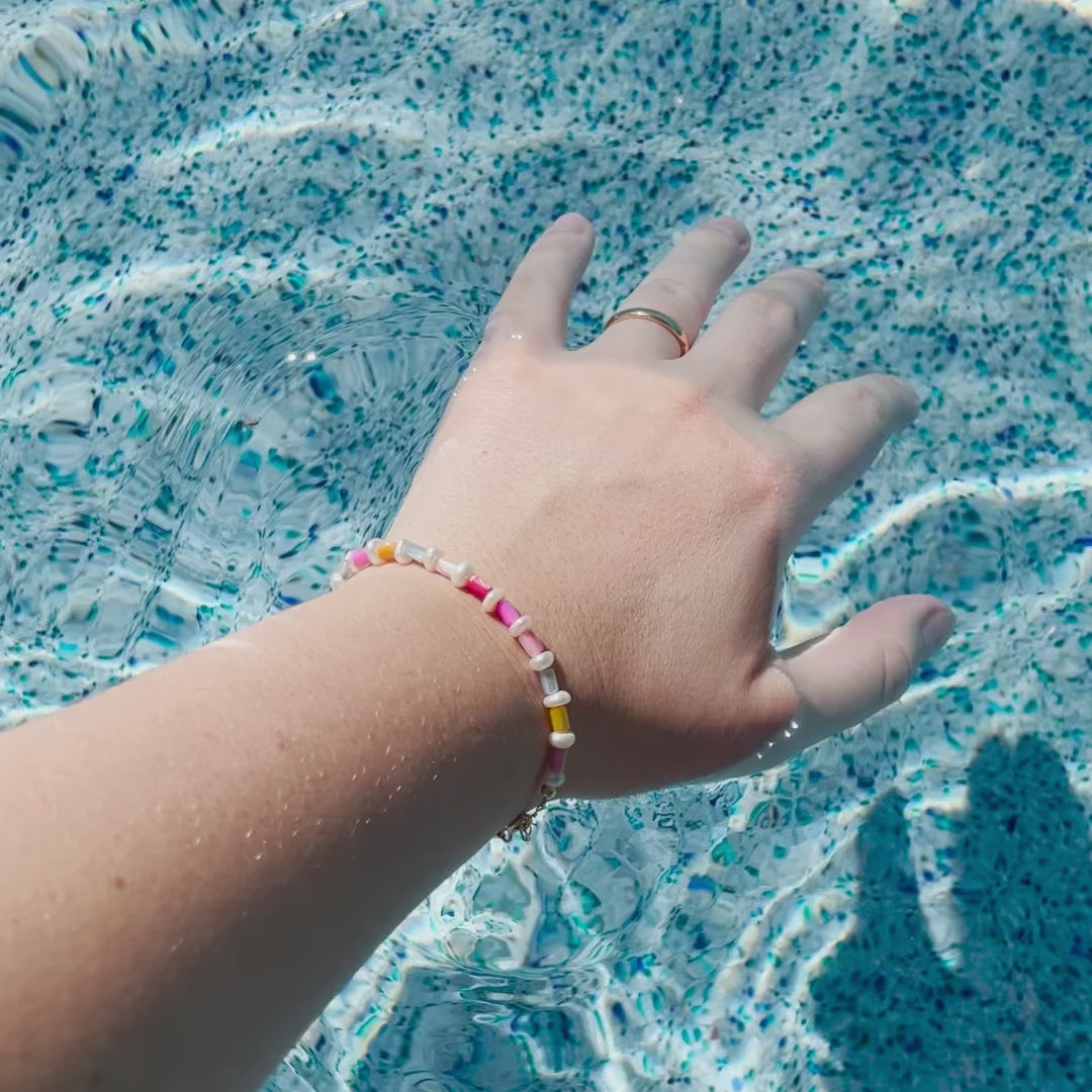 Rainbow Freshwater pearl bracelet with pride flag colours and rainbow design, video