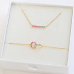 Bisexual Jewellery set with bisexual bracelet and bisexual necklace featuring colours of bisexual flag - gold