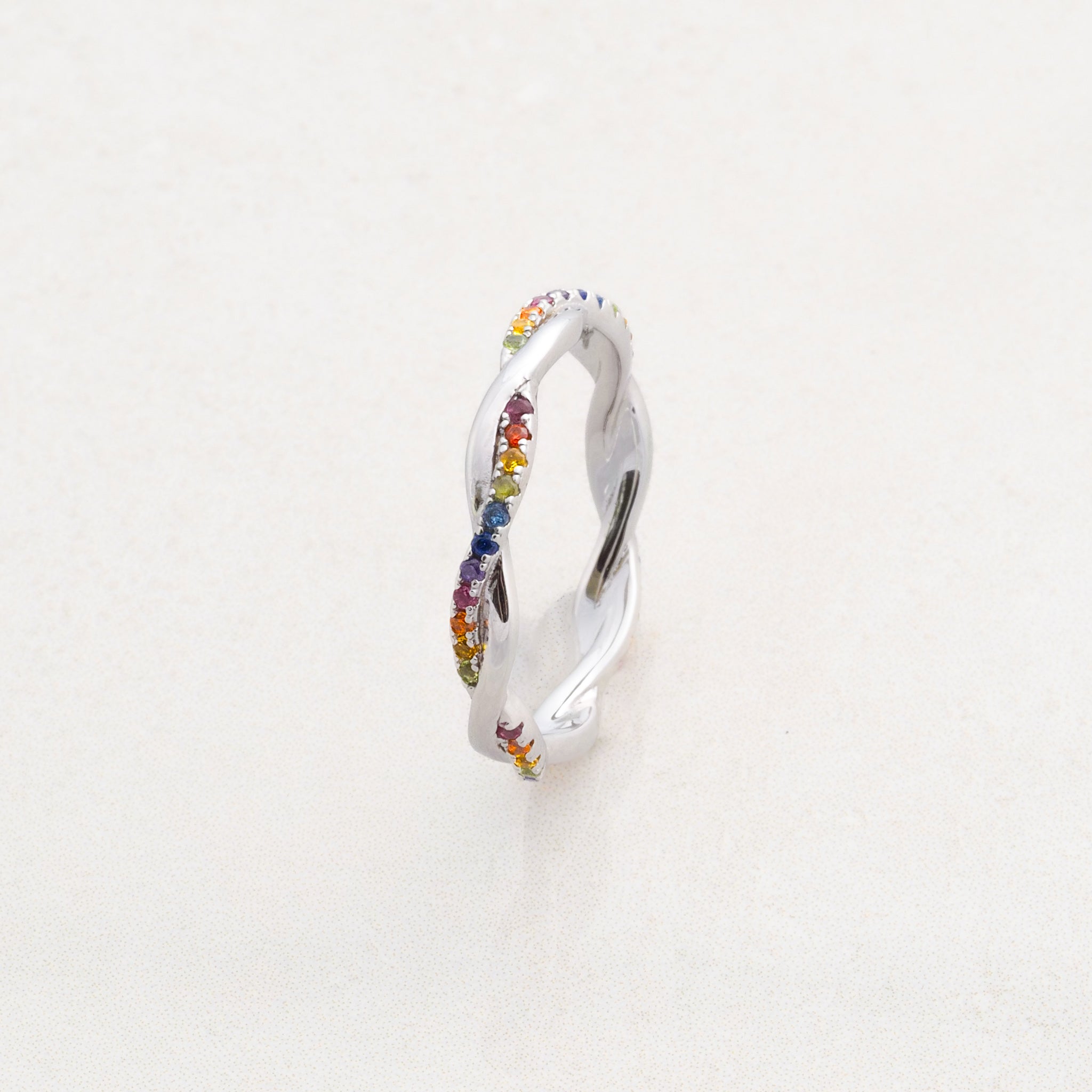rainbow twister ring as part of pride jewellery collection, rainbow pride ring top